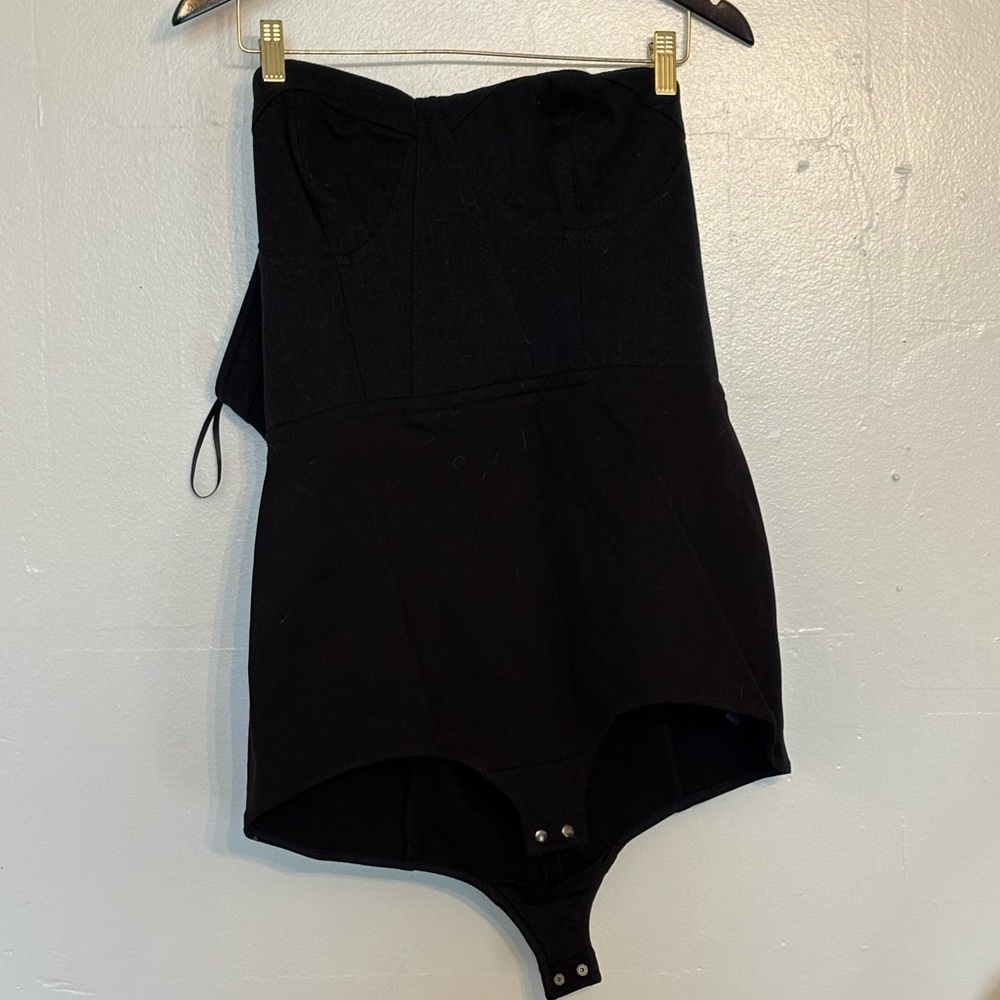 Black Strapless Bodysuit with a tulle belted skirt.. a great night out outfit